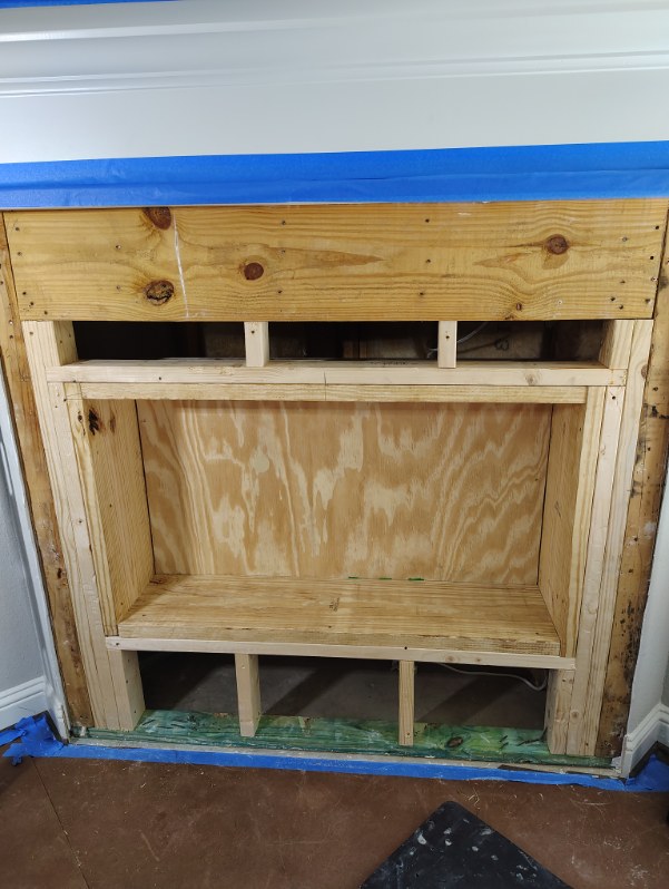 Fireplace opening reframed and blocked out for a new insert in Houston, TX