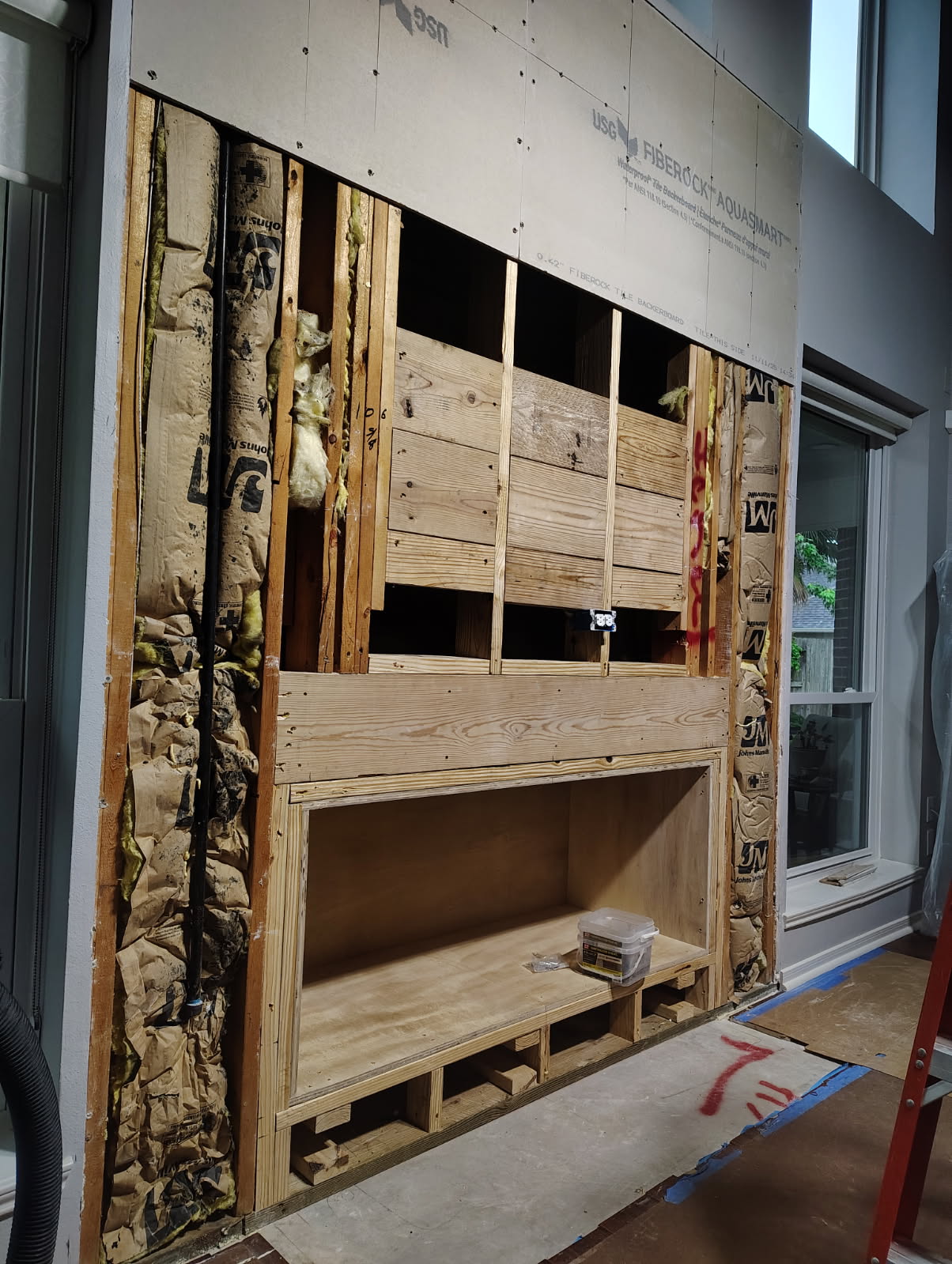 Fireplace feature wall framed for stone veneer in Houston, TX