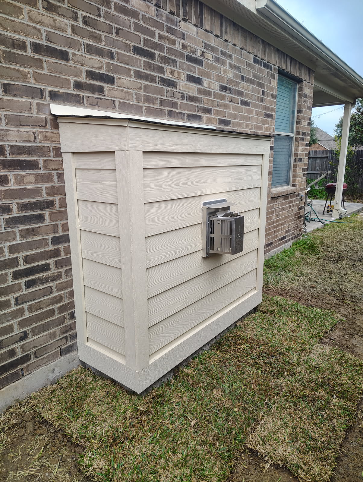 New exterior chimney chase framed and sided on a Houston, TX home