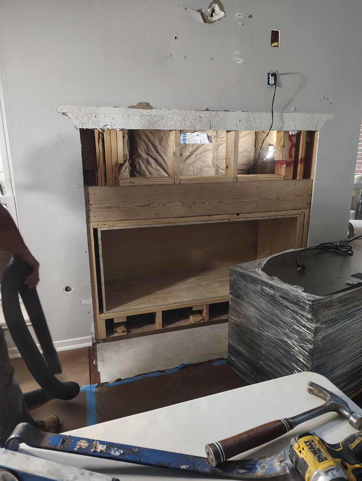 Old fireplace surround demolished ahead of a rebuild in Houston, TX